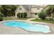 Large in-ground pool with patio area and landscaping around the main house at 5344 Mill Dam Rd, Wake Forest, NC 27587