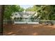 Fenced backyard with beautiful house, landscaping and an in-ground pool at 5344 Mill Dam Rd, Wake Forest, NC 27587