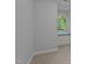 Relax by the beautiful arched window with window seat in the bedroom, creating a cozy retreat at 5344 Mill Dam Rd, Wake Forest, NC 27587