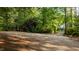 Landscaped lot with view of home's architectural details at 5344 Mill Dam Rd, Wake Forest, NC 27587