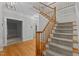 Spacious foyer with hardwood floors, stairs, and views into multiple rooms from the entryway at 5344 Mill Dam Rd, Wake Forest, NC 27587