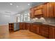 Kitchen featuring wood cabinets, tile backsplash, stainless steel appliances, and gas range at 5344 Mill Dam Rd, Wake Forest, NC 27587