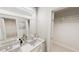 Modern bathroom with double sink vanity, large mirrors, and sleek, minimalist design at 537 Folk Song Way, Wendell, NC 27591