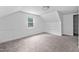 Inviting bedroom with dormer window, offering a cozy and bright atmosphere, perfect for relaxation and rest at 5601 Buffaloe Rd, Raleigh, NC 27616