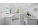 Laundry room with sink, washer, and dryer at 5601 Buffaloe Rd, Raleigh, NC 27616