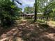 Large deck and screened porch offer outdoor living space in a private yard at 5809 Kimbal St, Raleigh, NC 27606