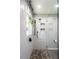 Contemporary bathroom features a tiled shower, stone flooring, and modern fixtures at 5809 Kimbal St, Raleigh, NC 27606
