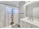 Updated bathroom featuring white vanity and patterned tile flooring at 602 Dunbar St, Durham, NC 27701