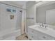 Bathroom featuring white subway tile with an integrated shower niche and a shower head at 602 Dunbar St, Durham, NC 27701