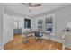 Office with hardwood floors, lots of light, and view to the living room at 602 Dunbar St, Durham, NC 27701