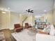 Open concept living area with hardwood floors, neutral sofa, and comfortable seating at 6536 Perry Creek Rd, Raleigh, NC 27616