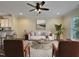Cozy living room shows neutral decor, stylish furniture, and lots of natural light at 6536 Perry Creek Rd, Raleigh, NC 27616