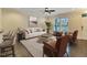 Bright living room featuring neutral decor, hardwood floors, and a modern ceiling fan at 6536 Perry Creek Rd, Raleigh, NC 27616