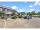 Well-maintained townhouse complex with ample parking and mature landscaping at 72 Justin Ct, Durham, NC 27705