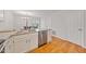 Open-concept kitchen boasts stainless steel appliances, granite countertops, and ample counter space at 72 Justin Ct, Durham, NC 27705