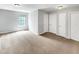 Spacious bedroom with neutral walls and flooring at 735 Sycamore Springs Dr, Fuquay Varina, NC 27526
