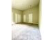 Spacious bedroom featuring neutral walls, carpet flooring, and ample closet space at 7832 Averette Field Dr, Raleigh, NC 27616