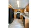 Well-equipped kitchen featuring stainless steel appliances and ample cabinet space at 7832 Averette Field Dr, Raleigh, NC 27616