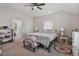 Bedroom with vaulted ceilings, ceiling fan, and comfortable furnishings create a cozy ambiance at 784 Crawford Rd, Coats, NC 27521