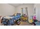 This is a bedroom with hardwood floors, and colorful furnishings at 784 Crawford Rd, Coats, NC 27521