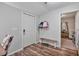 Functional entryway features a bench, storage, and access to other rooms at 784 Crawford Rd, Coats, NC 27521