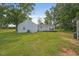 Spacious backyard with a deck provides ample outdoor space for entertaining at 784 Crawford Rd, Coats, NC 27521