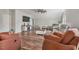This is a spacious living room with hardwood floors, nice furniture and a ceiling fan at 784 Crawford Rd, Coats, NC 27521