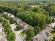Aerial view of tree-lined neighborhood streets and well-maintained homes at 904 Pirouette Ct, Raleigh, NC 27606
