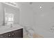 Bright bathroom featuring a vanity, toilet, and shower at 904 Pirouette Ct, Raleigh, NC 27606