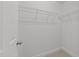Walk-in closet with wire shelving and ample storage space, providing organization for clothes and accessories at 904 Pirouette Ct, Raleigh, NC 27606
