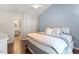 Spacious main bedroom featuring a large window and closet access at 1 Old Towne Pl, Durham, NC 27713