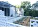 Beautifully landscaped exterior view showing modern architecture and meticulous landscaping at 100 Eastwood Lake Rd Rd, Chapel Hill, NC 27514