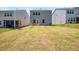 Lush backyard with a view of the patio, perfect for outdoor activities and relaxation at 1007 Sora Way, Durham, NC 27703