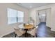 Cozy dining area with a round table and natural light at 1007 Sora Way, Durham, NC 27703