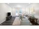 Bright and airy living room with stylish decor and ample seating at 1007 Sora Way, Durham, NC 27703