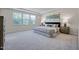 Spacious main bedroom with large windows and soft, neutral tones at 1007 Sora Way, Durham, NC 27703