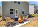 Cozy patio with outdoor seating and a decorative vase, creating an inviting space at 1007 Sora Way, Durham, NC 27703