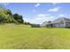 Expansive backyard with lush green lawn, above ground pool and ample space for recreation at 101 Hazel Ln Ln, Broadway, NC 27505