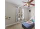 bedroom with grey carpet, ceiling fan, and monkey wall art at 101 Hazel Ln Ln, Broadway, NC 27505