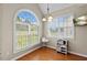 Cozy breakfast nook featuring a large window with natural light, hardwood floors, and a play kitchen at 101 Hazel Ln Ln, Broadway, NC 27505