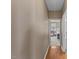 Hallway with hardwood flooring and a doorway leading into a bedroom with natural light at 101 Hazel Ln Ln, Broadway, NC 27505