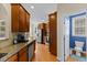 View of kitchen featuring wood cabinets, granite countertops, and stainless steel appliances at 101 Hazel Ln Ln, Broadway, NC 27505
