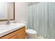 Functional bathroom featuring a single sink vanity, and a bathtub shower combination at 1033 Sagamore Dr, Louisburg, NC 27549