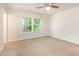 Cozy bedroom with a ceiling fan, neutral paint, and natural light at 1033 Sagamore Dr, Louisburg, NC 27549