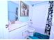 Well-lit bathroom with a modern vanity, updated fixtures, and a shower-tub combo with decorative curtain at 1141 Boxcar Way, Apex, NC 27502
