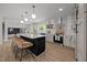 Stylish kitchen boasts a large island, stainless appliances, and pendant lighting at 1143 Sturdivant Dr, Cary, NC 27511