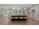 Stylish kitchen boasting a large island, stainless appliances, and pendant lighting at 1143 Sturdivant Dr, Cary, NC 27511