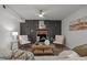 Inviting living room featuring fireplace, neutral color palette, and wood floors at 1143 Sturdivant Dr, Cary, NC 27511