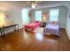 Bright bedroom with hardwood floors, twin beds and ample natural light at 11609 Us 401, Fuquay Varina, NC 27526