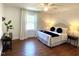 Comfortable bedroom features hardwood floors and a cozy atmosphere at 11609 Us 401, Fuquay Varina, NC 27526